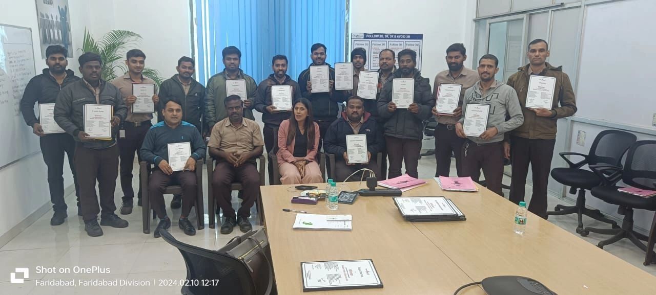A facilitated learning group displaying their completion certificates
